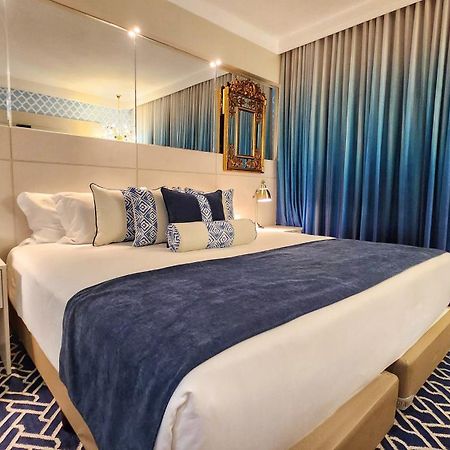 Golden Lis Hotel Boutique جويانيا المظهر الخارجي الصورة A bedroom at the hotel