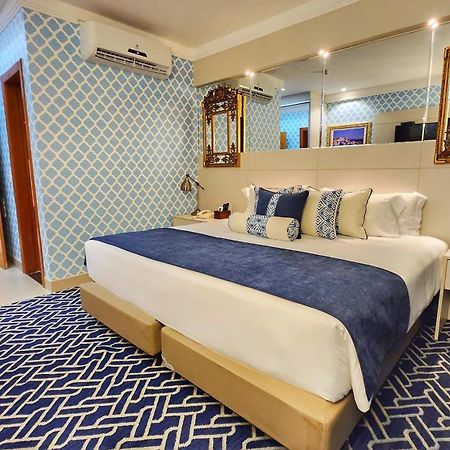 Golden Lis Hotel Boutique جويانيا المظهر الخارجي الصورة A bedroom at the hotel