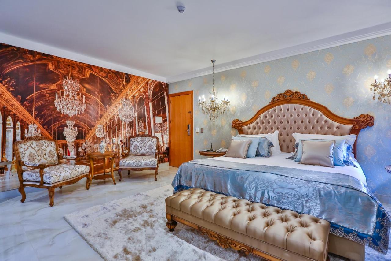 Golden Lis Hotel Boutique جويانيا المظهر الخارجي الصورة A bedroom in the hotel