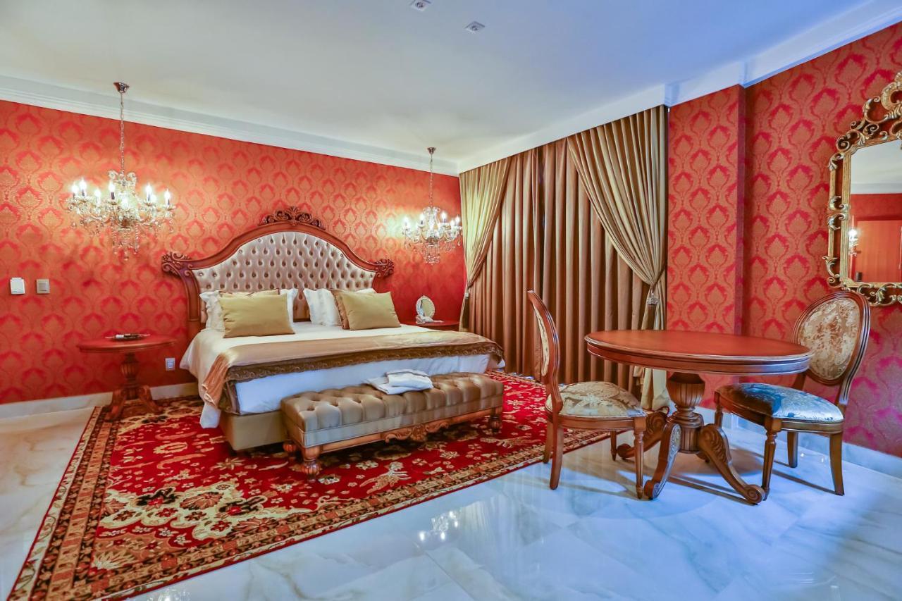 Golden Lis Hotel Boutique جويانيا المظهر الخارجي الصورة A bedroom at the hotel
