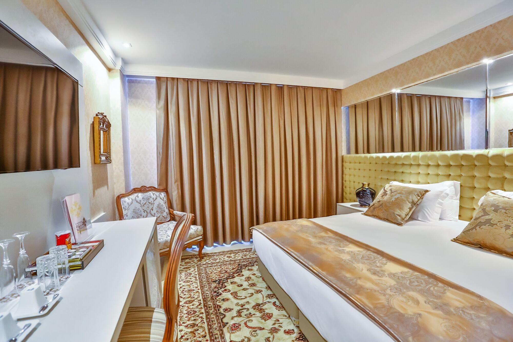 Golden Lis Hotel Boutique جويانيا المظهر الخارجي الصورة A room at the hotel