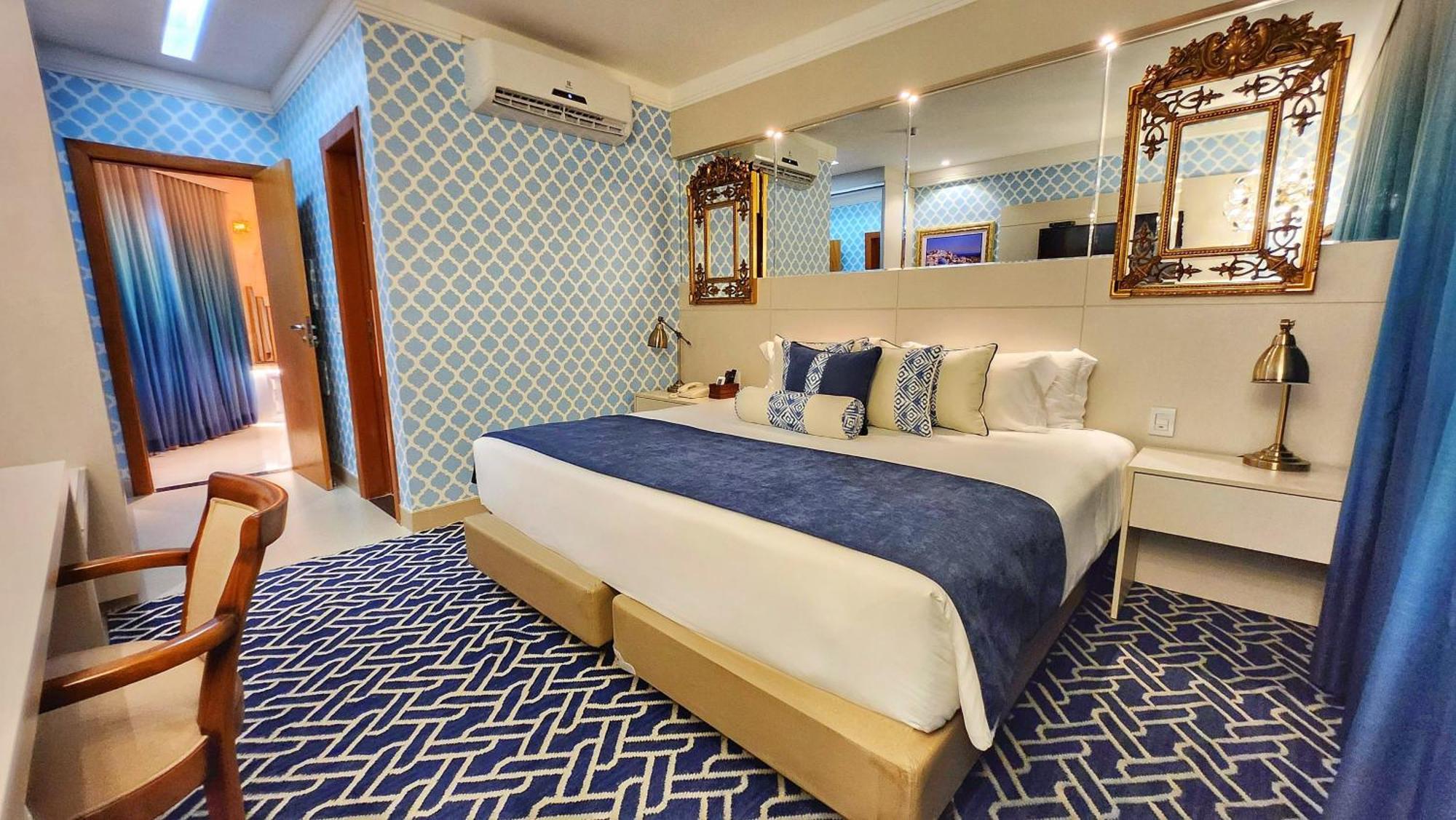 Golden Lis Hotel Boutique جويانيا المظهر الخارجي الصورة A bedroom at the hotel